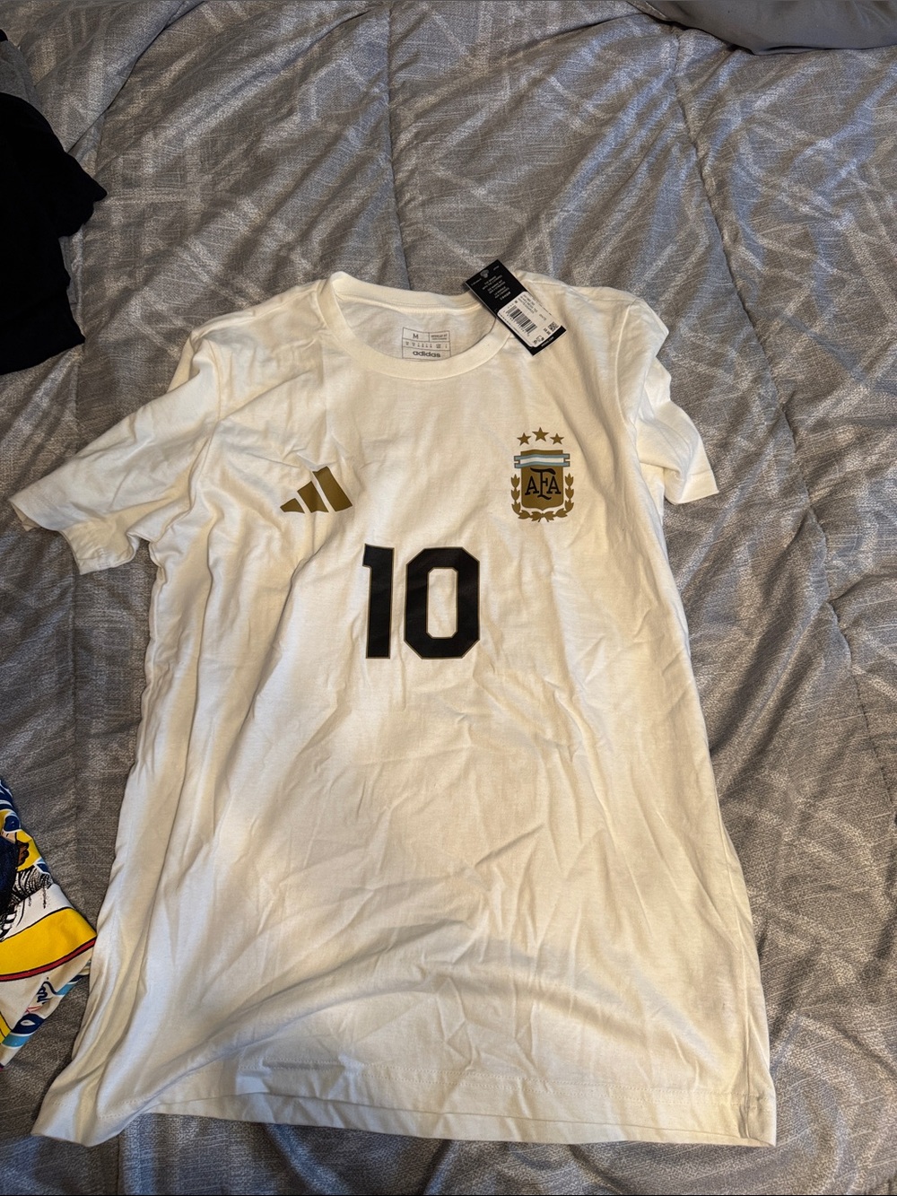 adidas White Kids Soccer Jersey with Black Number 10 and Gold Crest
